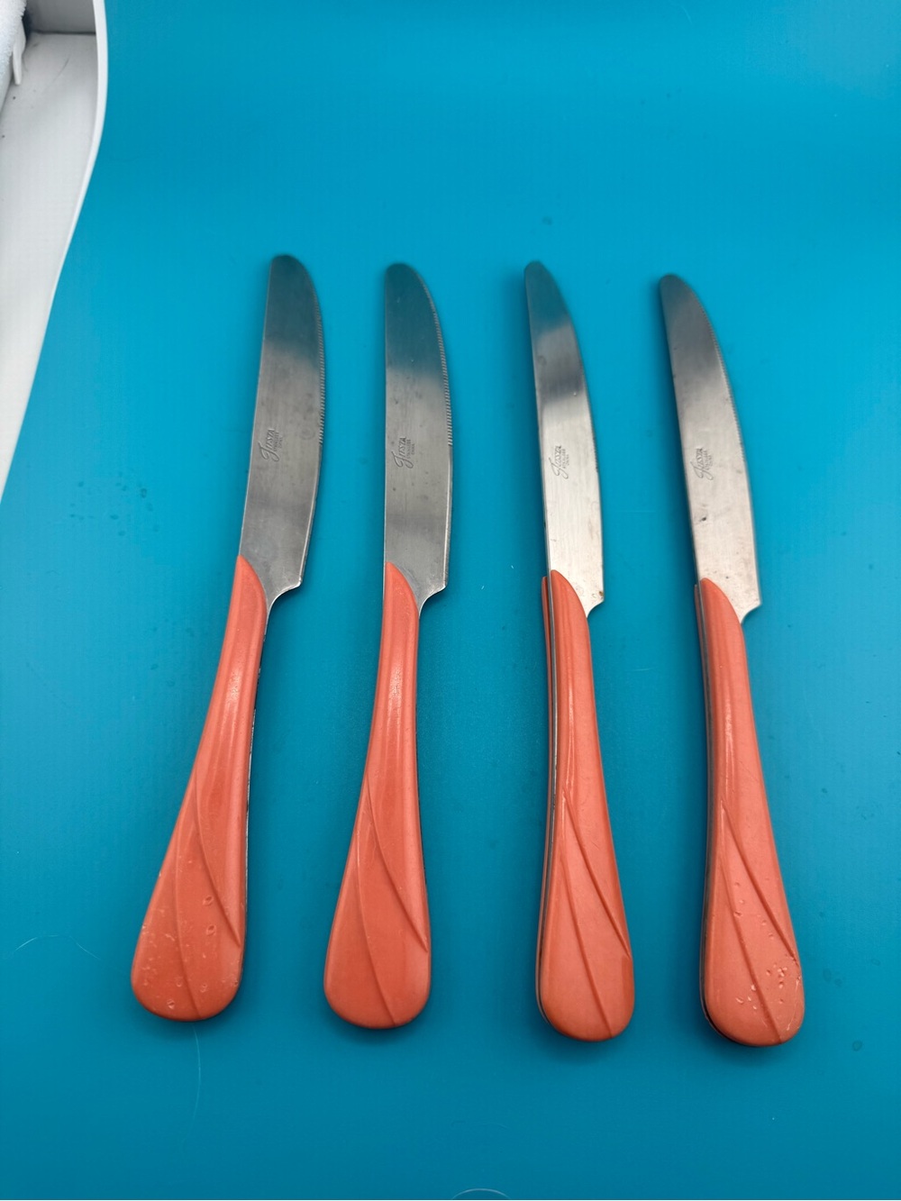 Fiestaware Coral Orange Handle Stainless Table Knives - Set of 4